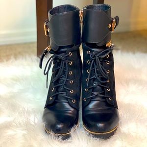 Italina suede and faux leather tie up ankle boots.